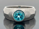RING AUS 925/- SILBER RHODINIERT MIT TOPAS (BEH.) PARAIBAFARBEN (CA. 0,9 ct.)