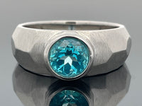 RING AUS 925/- SILBER RHODINIERT MIT TOPAS (BEH.) PARAIBAFARBEN (CA. 0,9 ct.)