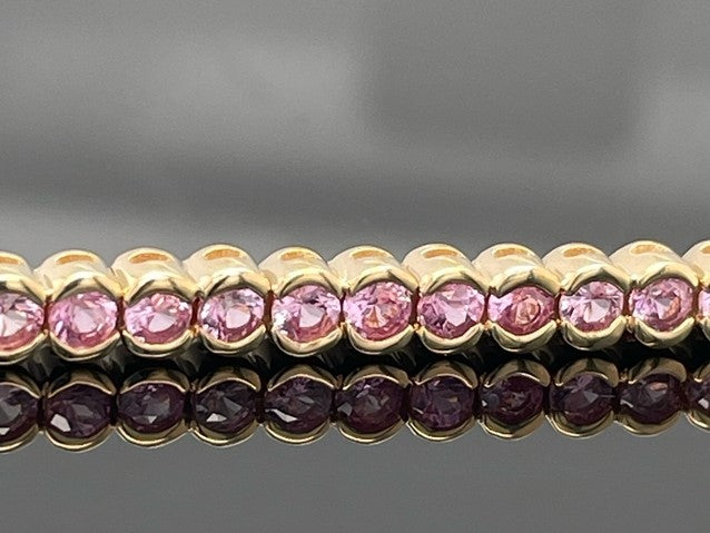 ARMBAND AUS 585/- GELBGOLD MIT PADPARADSCHA SAPHIR (GES.CA. 4,62 ct.)