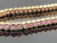 ARMBAND AUS 585/- GELBGOLD MIT PADPARADSCHA SAPHIR (GES.CA. 4,62 ct.)
