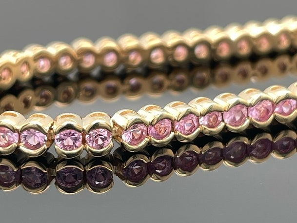 ARMBAND AUS 585/- GELBGOLD MIT PADPARADSCHA SAPHIR (GES.CA. 4,62 ct.)