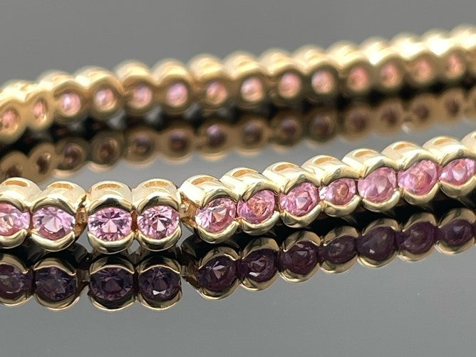 ARMBAND AUS 585/- GELBGOLD MIT PADPARADSCHA SAPHIR (GES.CA. 4,62 ct.)