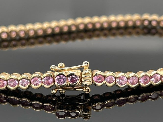 ARMBAND AUS 585/- GELBGOLD MIT PADPARADSCHA SAPHIR (GES.CA. 4,62 ct.)