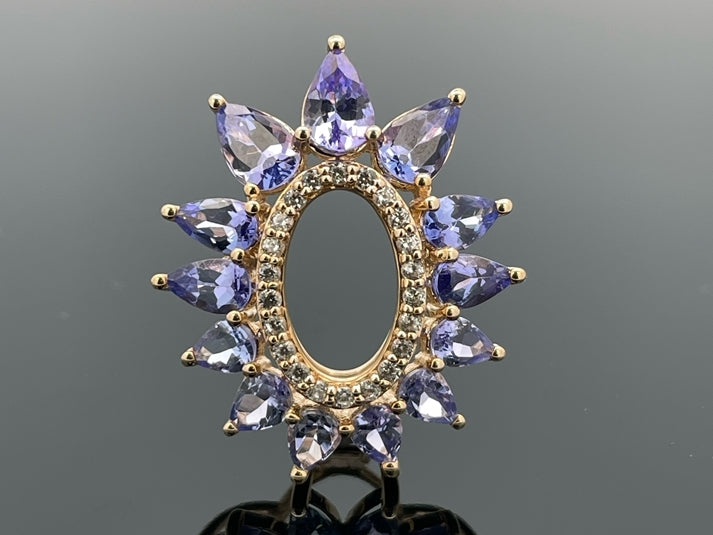 ANHÄNGER AUS 375/- GELBGOLD MIT TANSANIT & ZIRKON ( GES. CA. 3,014 ct.)