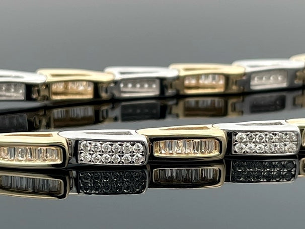 ARMBAND AUS 585/- GOLD BICOLOR MIT DIAMANTEN ( GES. CA. 1,00 ct.)