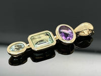 CLIP ANHÄNGER AUS 375/- GELBGOLD MIT MULTI EDELSTEINE (GES. CA. 2,03 ct.)