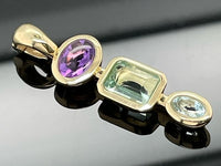 CLIP ANHÄNGER AUS 375/- GELBGOLD MIT MULTI EDELSTEINE (GES. CA. 2,03 ct.)