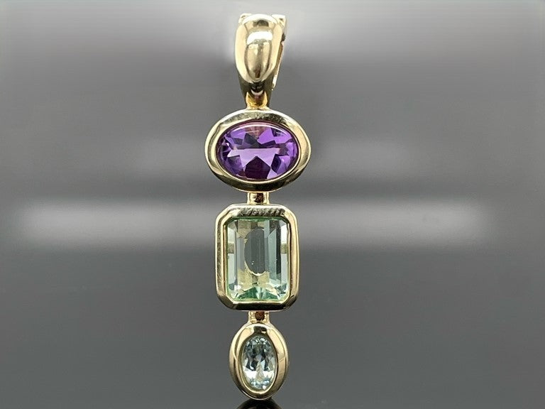 CLIP ANHÄNGER AUS 375/- GELBGOLD MIT MULTI EDELSTEINE (GES. CA. 2,03 ct.)