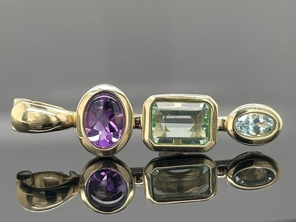 CLIP ANHÄNGER AUS 375/- GELBGOLD MIT MULTI EDELSTEINE (GES. CA. 2,03 ct.)