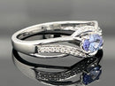 RING AUS 925/- SILBER RHODINIERT MIT TANSANIT AA & ZIRKON