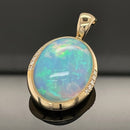 ANHÄNGER AUS 585/- GELBGOLD mit Kristallopal und Brillanten (ca. 9,10 ct.)