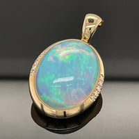 ANHÄNGER AUS 585/- GELBGOLD mit Kristallopal und Brillanten (ca. 9,10 ct.)