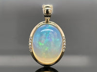 ANHÄNGER AUS 585/- GELBGOLD mit Kristallopal und Brillanten (ca. 9,10 ct.)