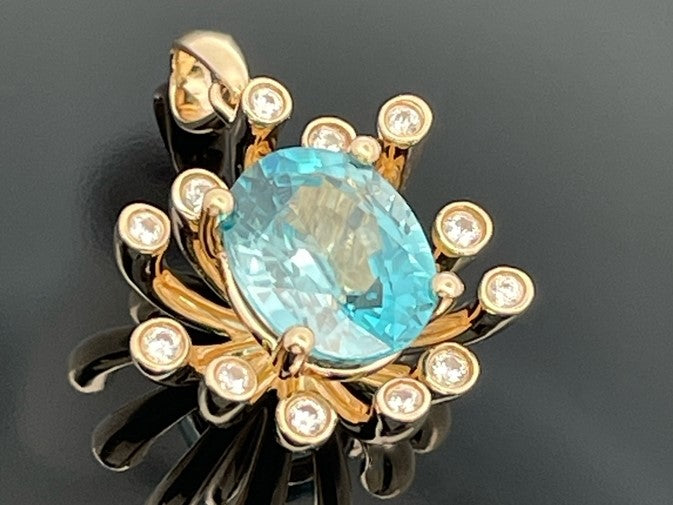 ANHÄNGER AUS 375/- GELBGOLD mit Zirkon (ca. 3,85 ct.)