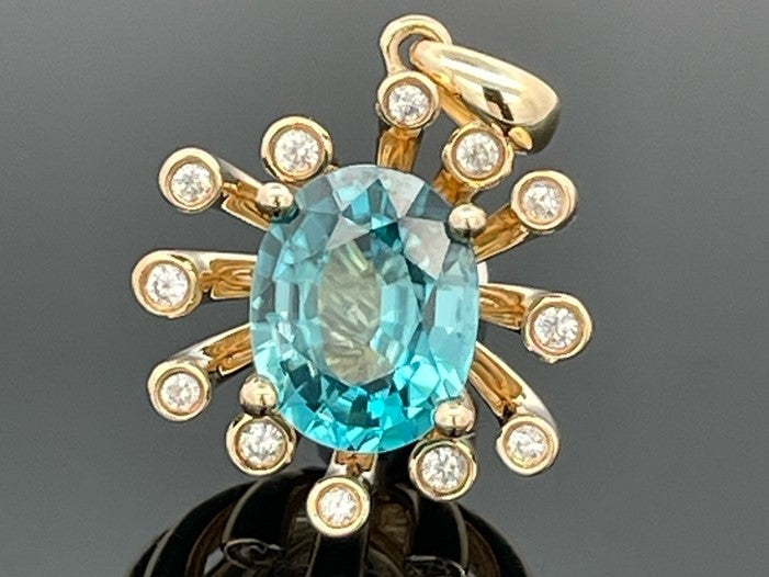 ANHÄNGER AUS 375/- GELBGOLD mit Zirkon (ca. 3,85 ct.)