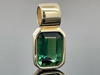 ANHÄNGER AUS 375/- GELBGOLD MIT GOLKONDA TURMALIN (CA. 1,10 ct.)