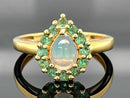 RING AUS 925/- SILBER VERGOLDET MIT ÄTHIOP. OPAL & SMARAGDEN