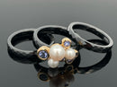 RING SET GR. 17 (CA.53) AUS 375/- GELBGOLD & KERAMIK MIT TANSANIT & SWZP