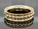 DREHRING AUS 375/- GELBGOLD MIT PARAIBATURMALIN (ca. 0,14 ct.)