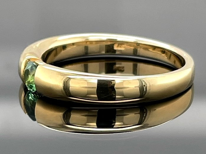 RING AUS 375/- GELBGOLD MIT GOLKONDA TURMALIN (CA.0,19 ct.)