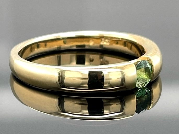 RING AUS 375/- GELBGOLD MIT GOLKONDA TURMALIN (CA.0,19 ct.)