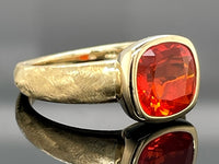 RING AUS 375/- GELBGOLD MIT FEUEROPAL (CA.1,08 ct.)