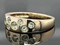 RING AUS 375/- GELBGOLD MIT PARAIBA-TURMALIN (ges.ca. 0,45 ct.)