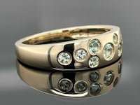 RING AUS 375/- GELBGOLD MIT PARAIBA-TURMALIN (ges.ca. 0,45 ct.)