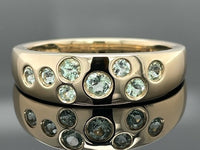 RING AUS 375/- GELBGOLD MIT PARAIBA-TURMALIN (ges.ca. 0,45 ct.)