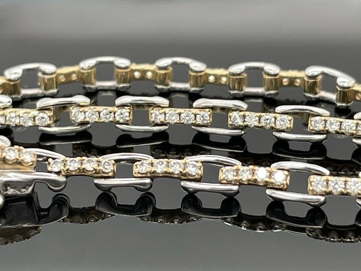 ARMBAND 950/-PLATIN & 585/- GELBGOLD MIT  BRILLANTEN LR (GES.MIND. CA.1,00 ct.)