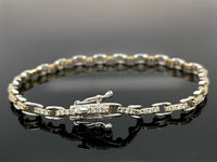 ARMBAND 950/-PLATIN & 585/- GELBGOLD MIT  BRILLANTEN LR (GES.MIND. CA.1,00 ct.)