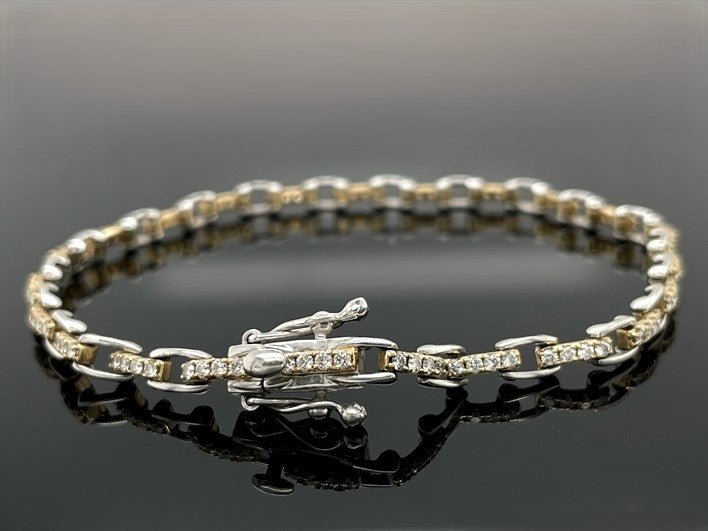 ARMBAND 950/-PLATIN & 585/- GELBGOLD MIT  BRILLANTEN LR (GES.MIND. CA.1,00 ct.)