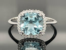 RING AUS 375/- WEIßGOLD MIT BLAUTOPAS & ZIRKONIA
