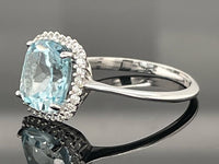 RING AUS 375/- WEIßGOLD MIT BLAUTOPAS & ZIRKONIA