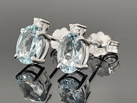 OHRSTECKER AUS 375/- WEIßGOLD MIT AQUAMARIN & BRILLANTEN