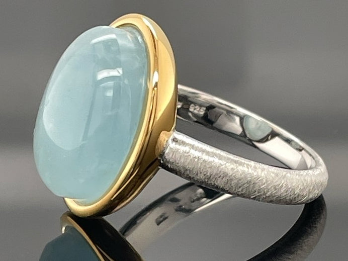 RING AUS 925/- SILBER BICOLOR MIT MILKY AQUAMARIN (CA. 7,0 ct.)