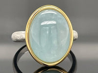 RING AUS 925/- SILBER BICOLOR MIT MILKY AQUAMARIN (CA. 7,0 ct.)