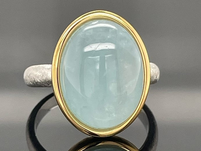 RING AUS 925/- SILBER BICOLOR MIT MILKY AQUAMARIN (CA. 7,0 ct.)
