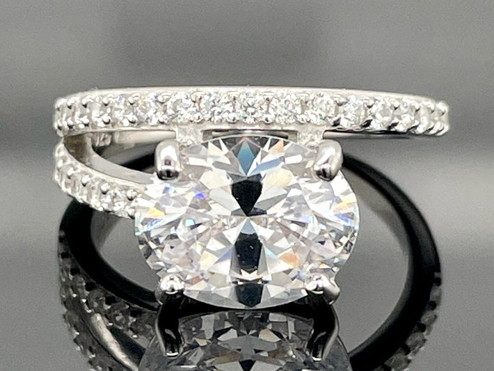 RING AUS 925/- SILBER RHODINIERT MIT ZIRKONIA