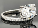 RING AUS 925/- SILBER RHODINIERT MIT ZIRKONIA