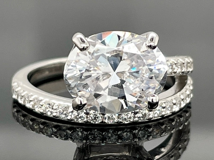 RING AUS 925/- SILBER RHODINIERT MIT ZIRKONIA