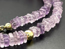 COLLIER 375/- GELBGOLD MIT AMETHYST & HÄMATIT BEH. (GES. CA. 95,0 ct.)