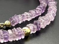 COLLIER 375/- GELBGOLD MIT AMETHYST & HÄMATIT BEH. (GES. CA. 95,0 ct.)