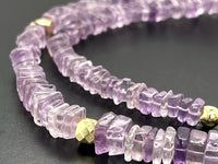 COLLIER 375/- GELBGOLD MIT AMETHYST & HÄMATIT BEH. (GES. CA. 95,0 ct.)