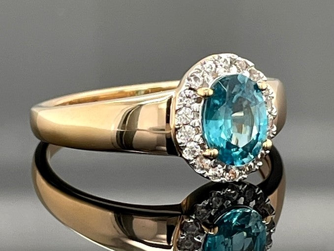 RING AUS 925/- SILBER VERGOLDET MIT ZIRKON BLAU & WEIß