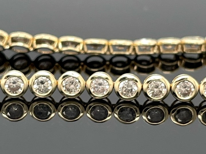 ARMBAND AUS 585/- GELBGOLD MIT BRILLANTEN