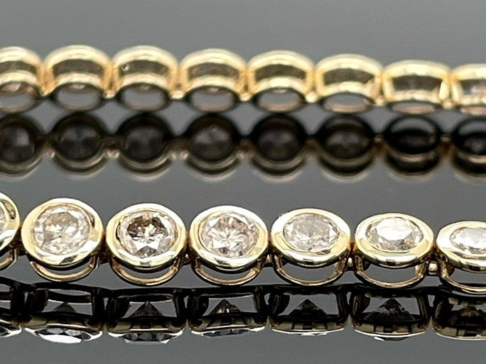 ARMBAND AUS 585/- GELBGOLD MIT BRILLANTEN