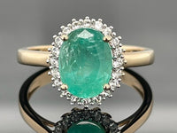 RING AUS 375/- GELBGOLD MIT SAMBIA SMARAGD & ZIRKON ( GES. CA. 1,83 ct.)