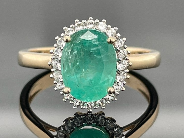 RING AUS 375/- GELBGOLD MIT SAMBIA SMARAGD & ZIRKON ( GES. CA. 1,83 ct.)
