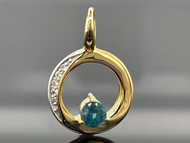 ANHÄNGER AUS 925/- SILBER VERGOLDET MIT KYANIT & ZIRKON